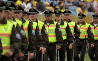 Ecuador increases size of police force with new graduates but lacks space, guns, pistols and helmets for them.